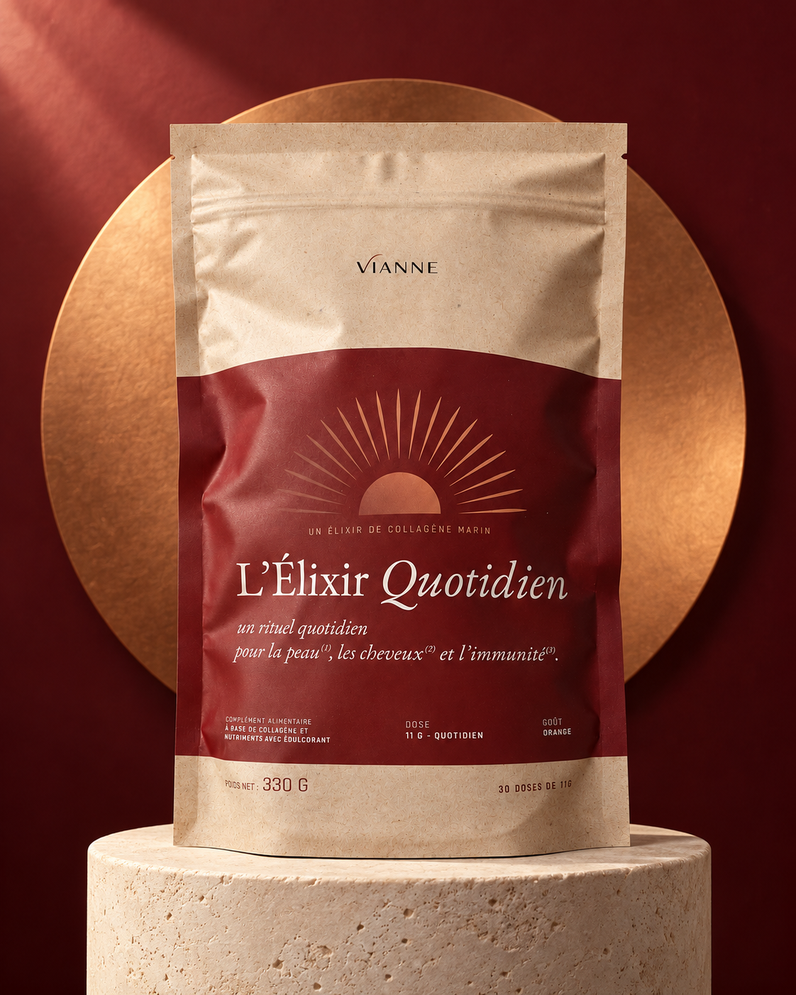A stand-up pouch of Vénise L’Élixir Quotidien, displayed on a textured stone pedestal in front of a gold circular backdrop against a deep red background.